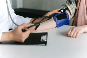 doctor measuring blood pressure