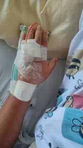 Hand of Patient of hand foot mouth disease in hindi with Bandage and PVC