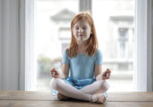 a girl doing meditation