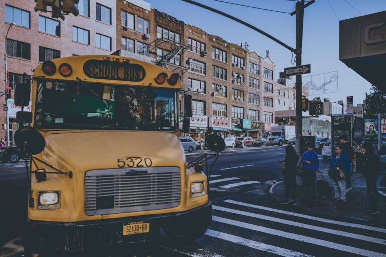 Yellow Bus on Street creating pollution