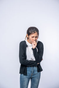 a teenage girl having asthma attack and dificulty in breathing