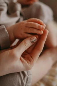 a newborn handa and nail display