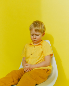 6 yrs boy has fecal incontinence.sitting quitly and sad